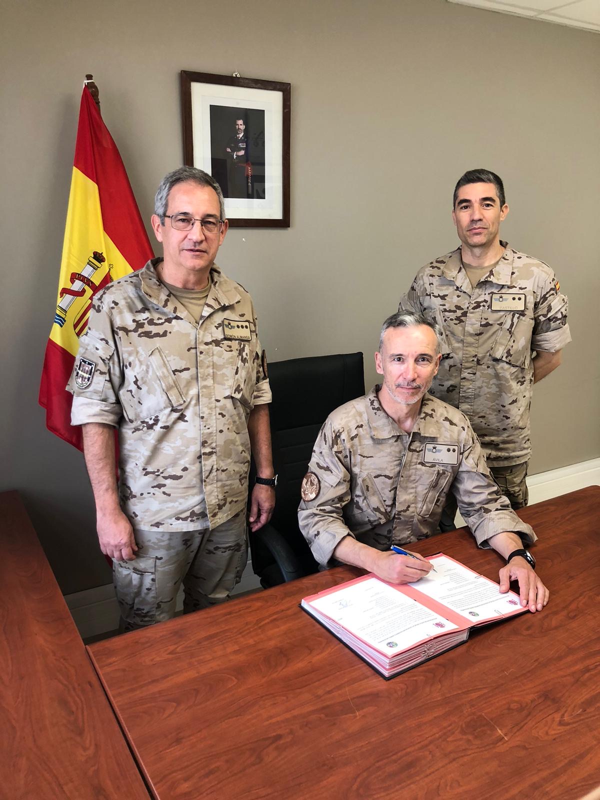 Incoming Force Commander signs Act of Relay of Command