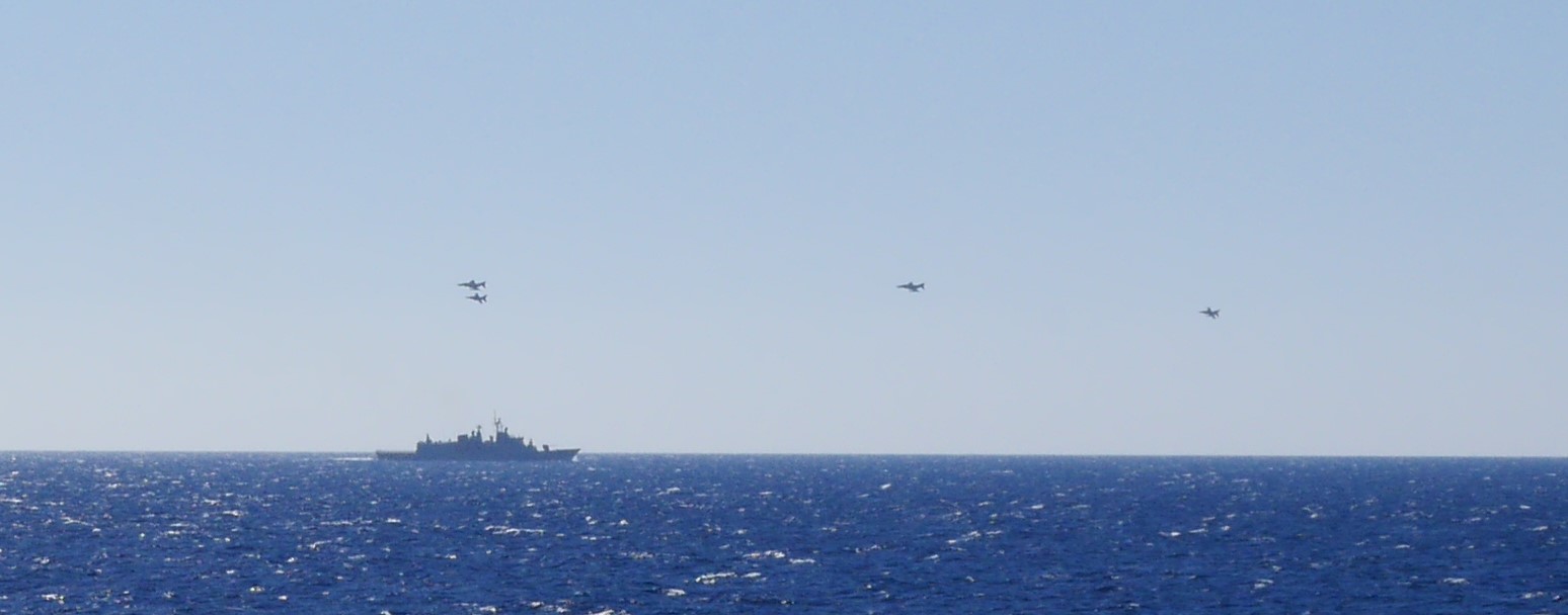 Fighters flying over the ship  'Spetsai'