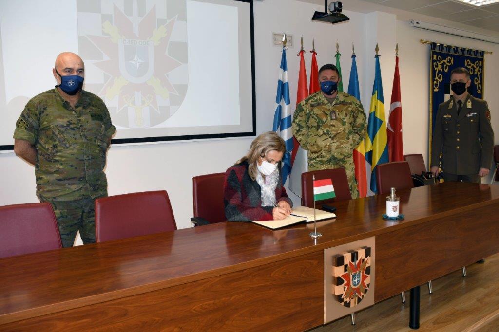 Ambassador Tóth signs the C-IED CoE Book of Honor