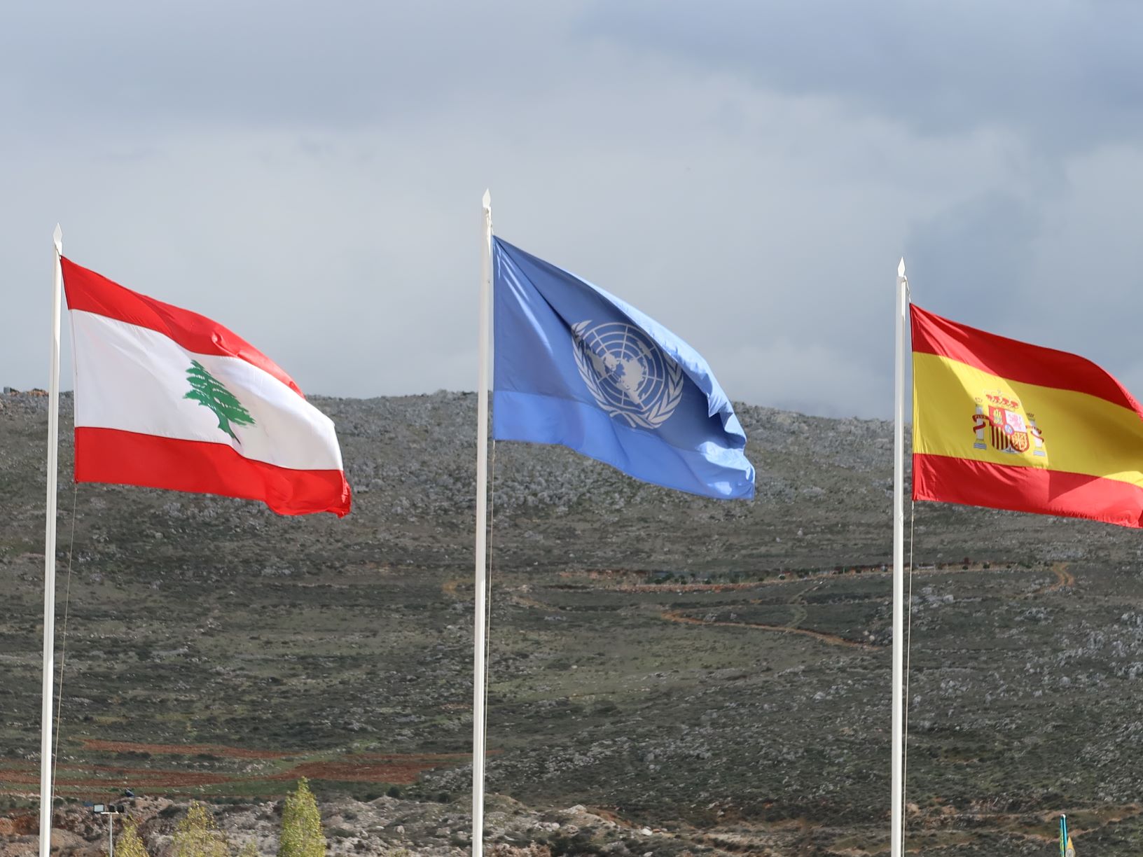 UN, Lebanon and Spain flags