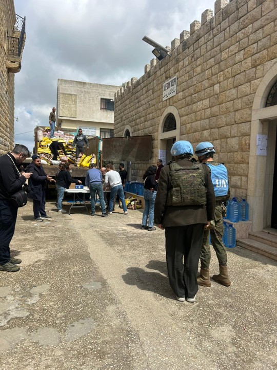 Unloading a lorry carrying humanitarian aid