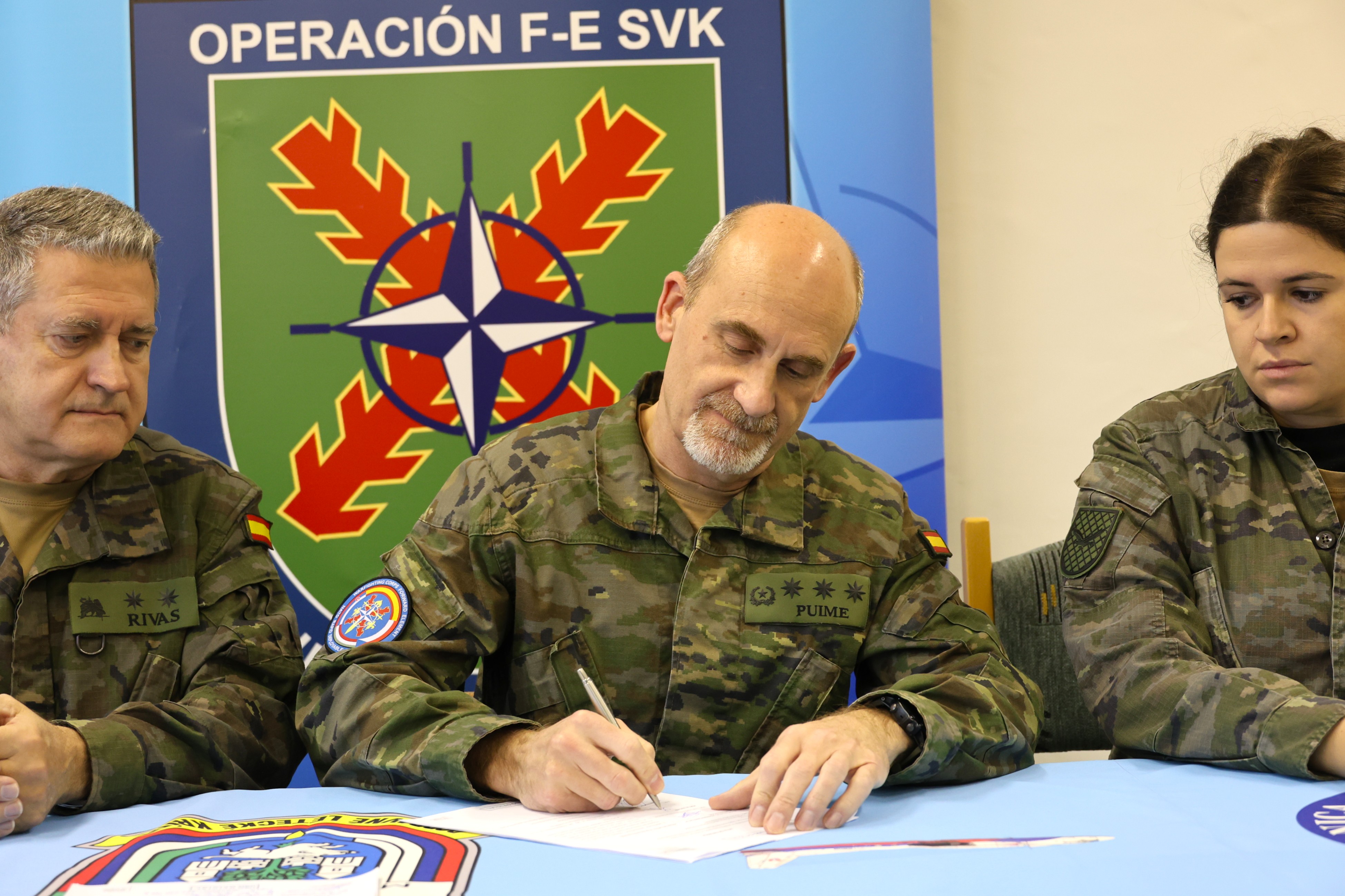 Signing the hangar handover document
