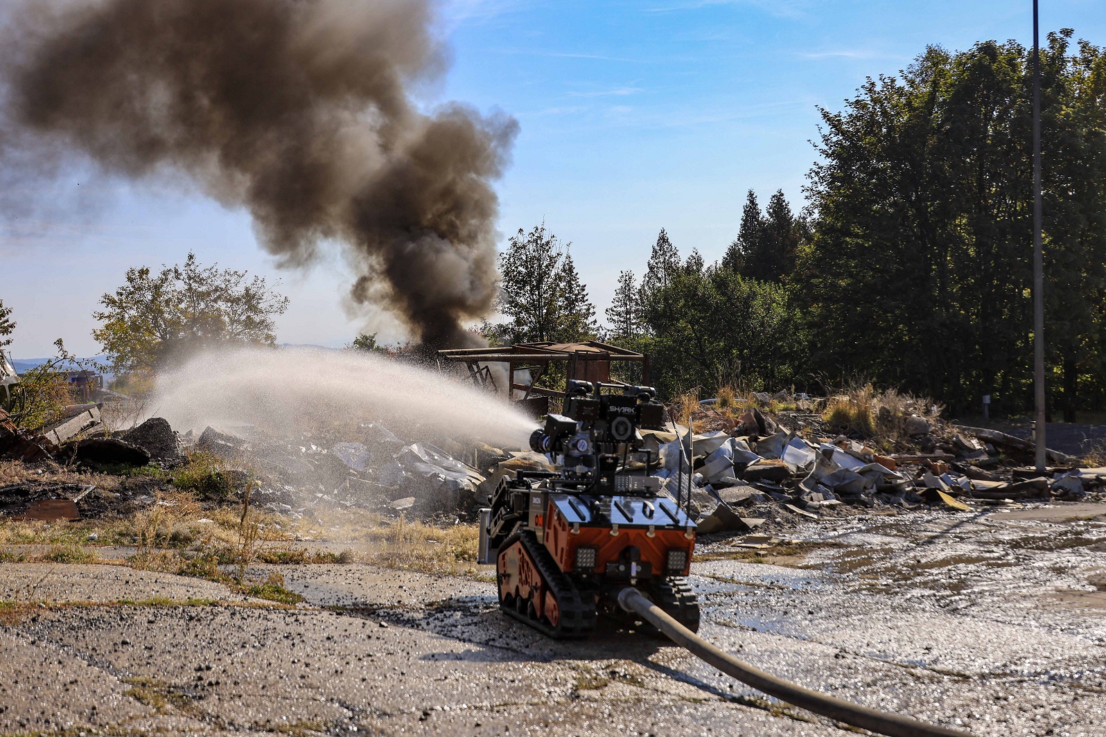 Unmanned vehicle used in fire-fighting operations