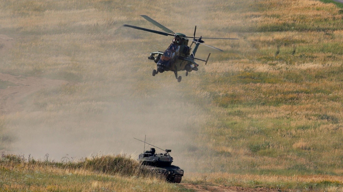 Leopard 2A-6 Portuguese battle tank interacting with Tigre Spanish helicopter