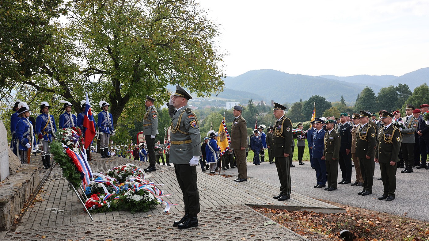 Solemn moment of floral tribute