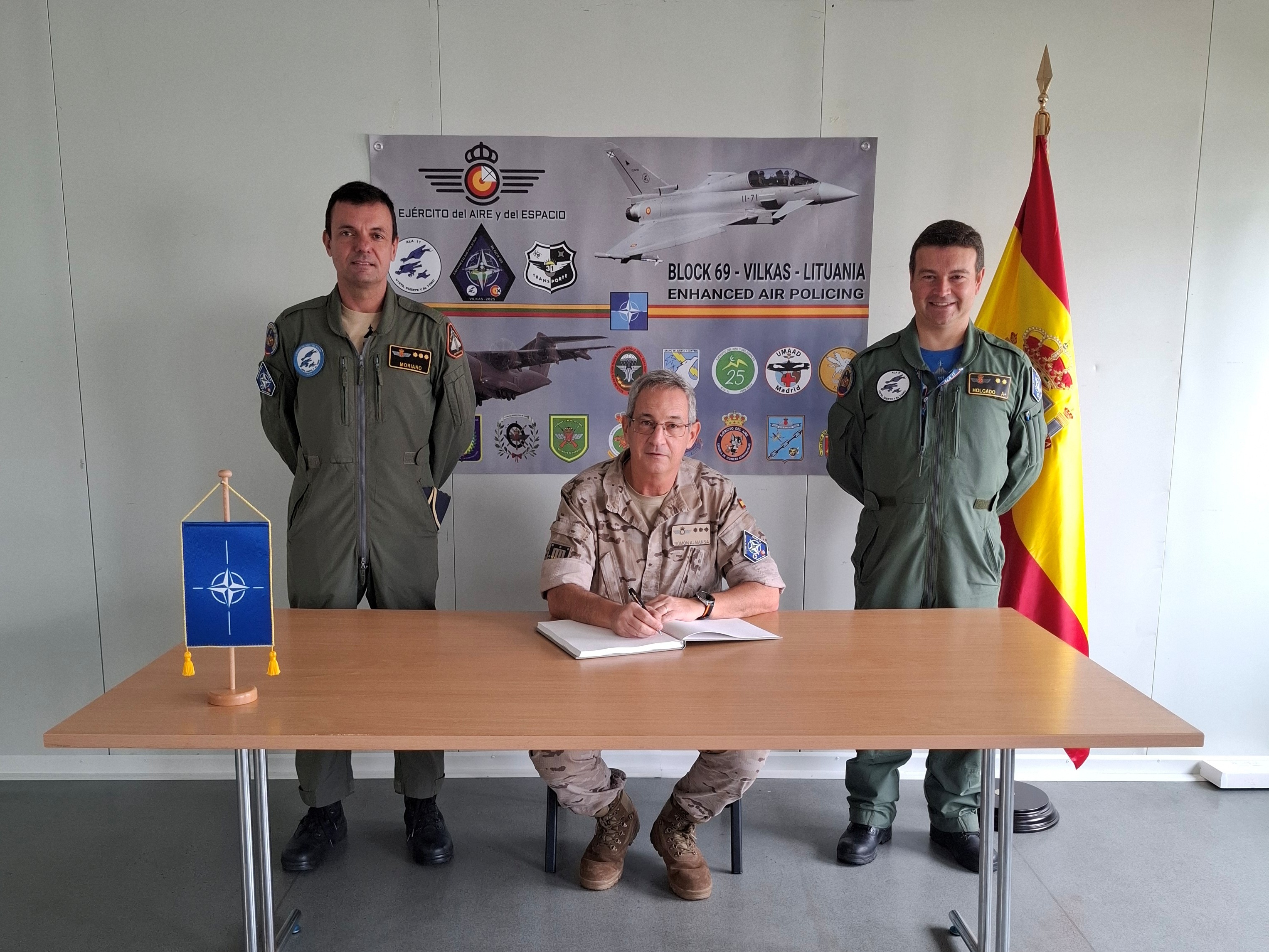 The Operations Command (MOPS) representative signing the Book of Honour