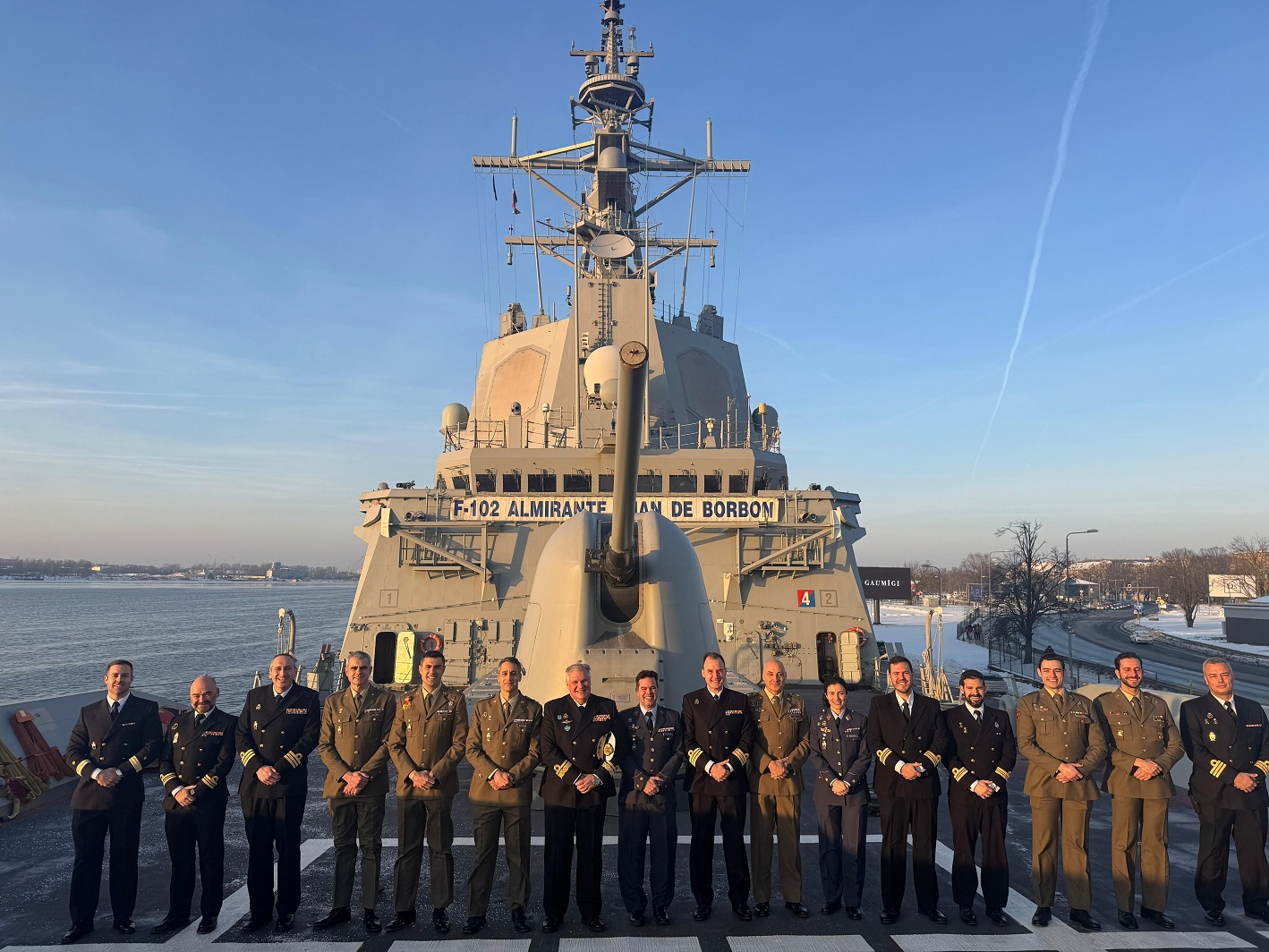 The frigate's crew welcomes their deployed colleagues