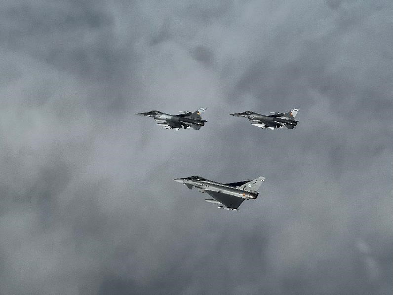 Spanish Eurofighters fly a mission with Romanian F-16s