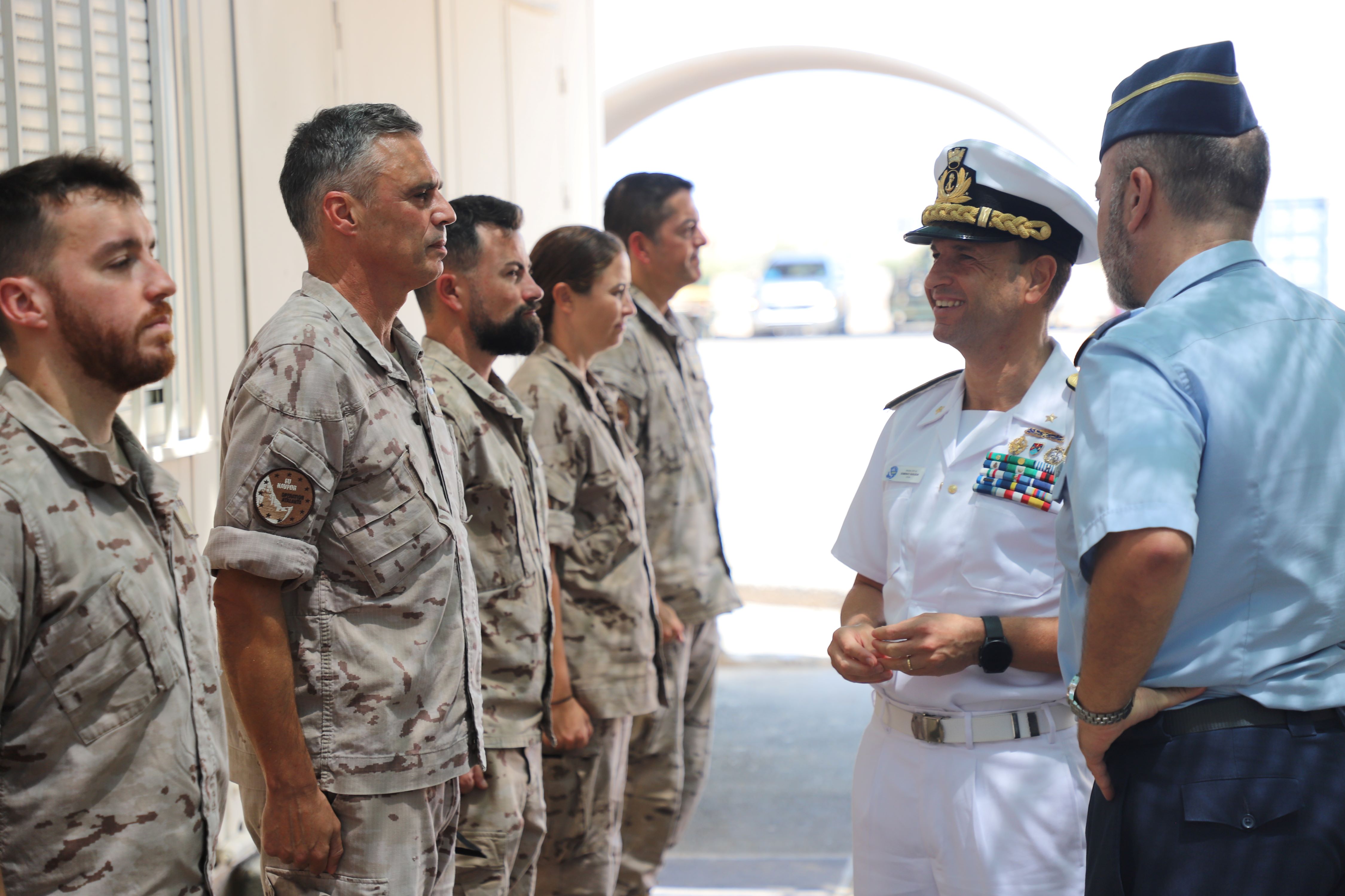 Commodore Guglielmi greets DAT Orion personnel