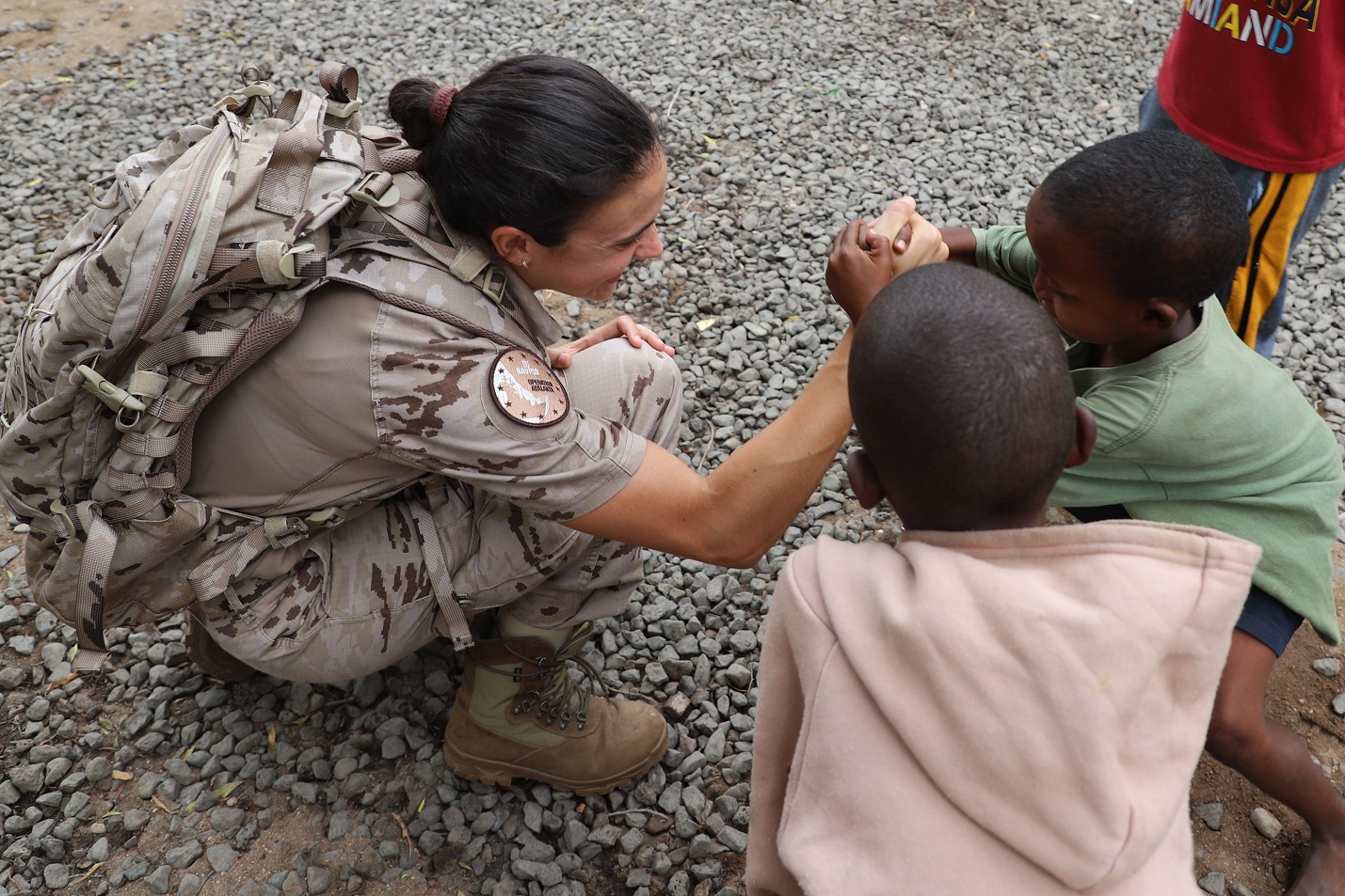 Member of the 57th contingent with children from Caritas Djibouti