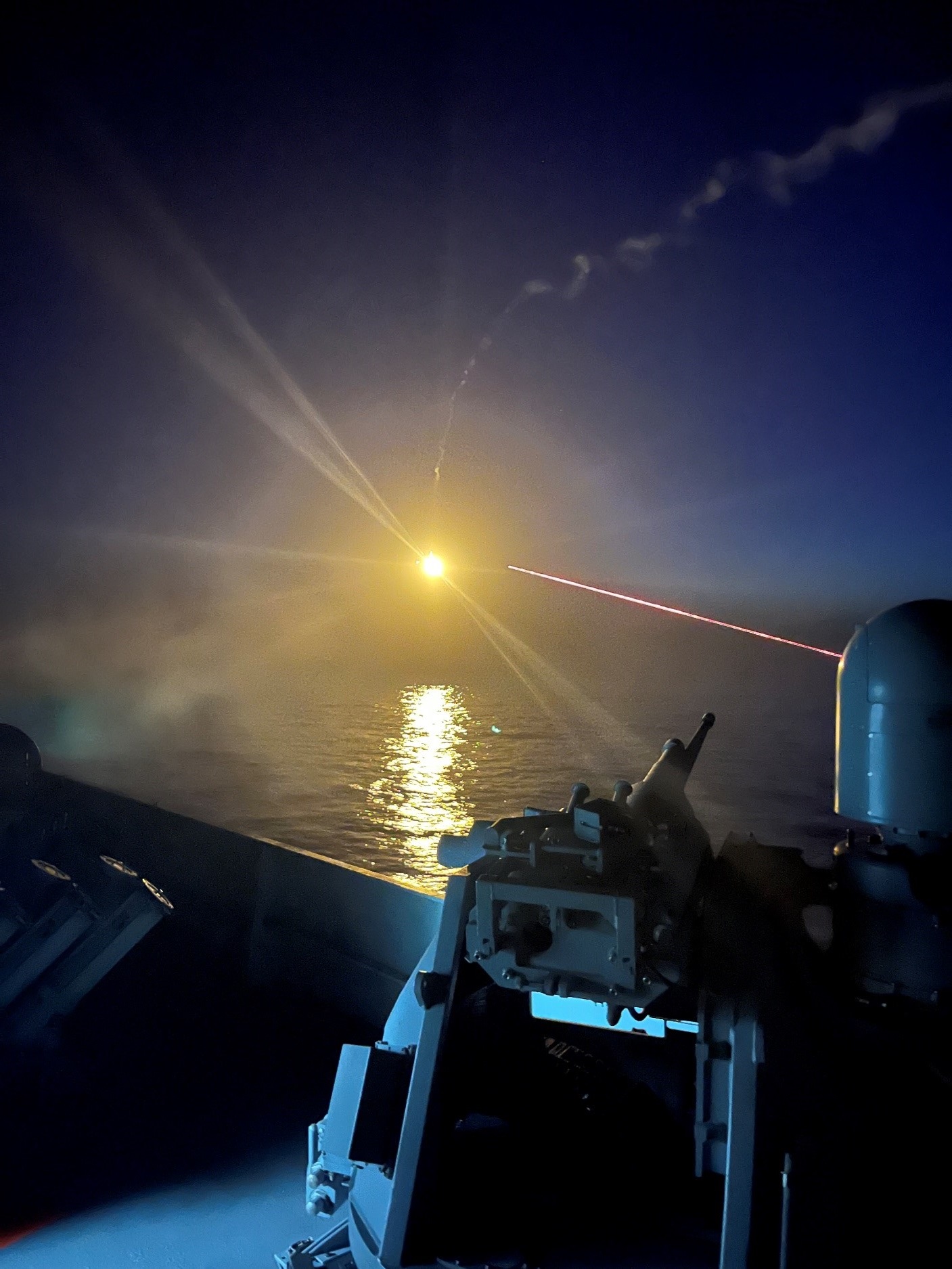 The OPV 'Audaz' conducts a night shooting exercise
