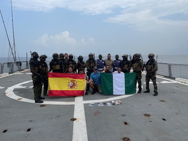 Participants of the anti-smuggling exercise pose on the flight deck of the BAM ‘Meteoro’ during GANO-24.