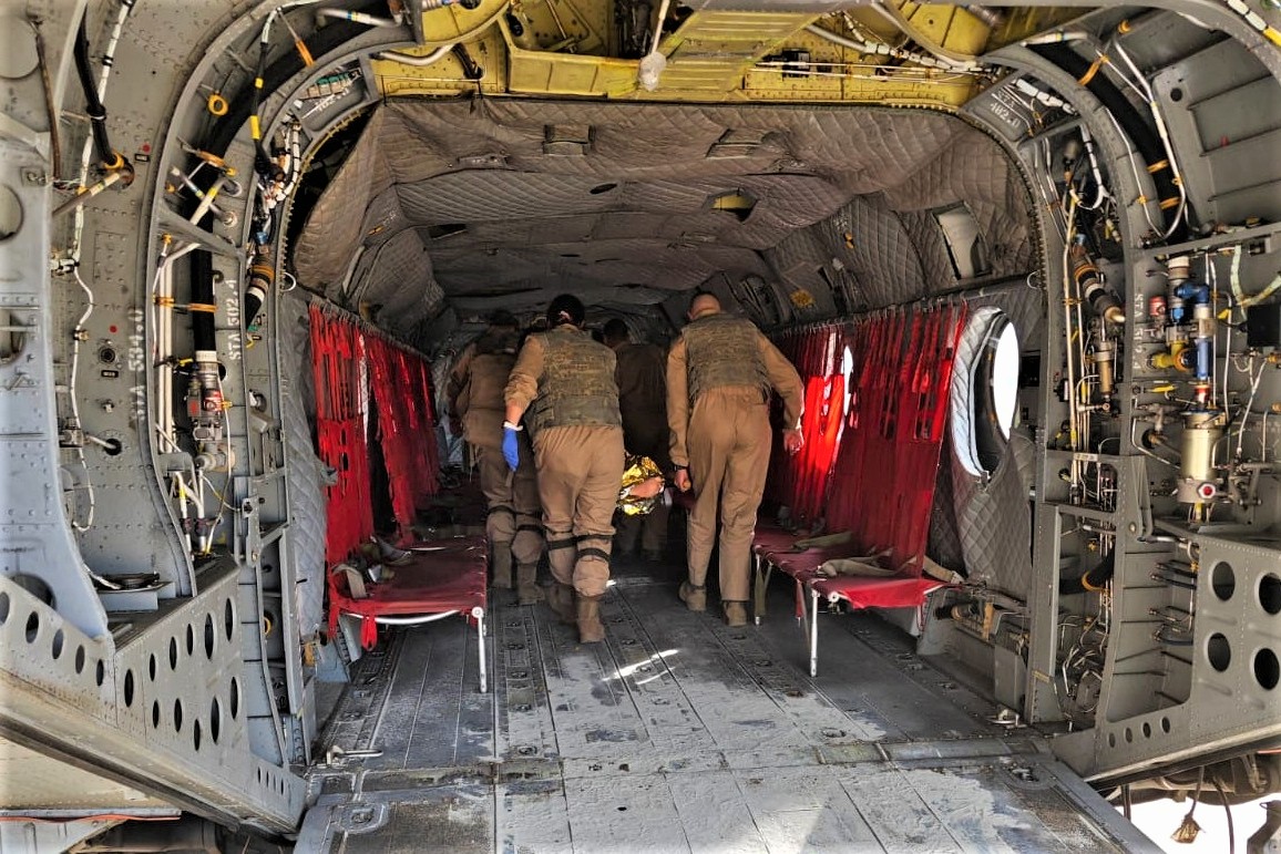 Practice transporting an injured person by helicopter