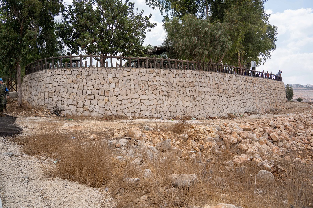 Water tank retaining wall