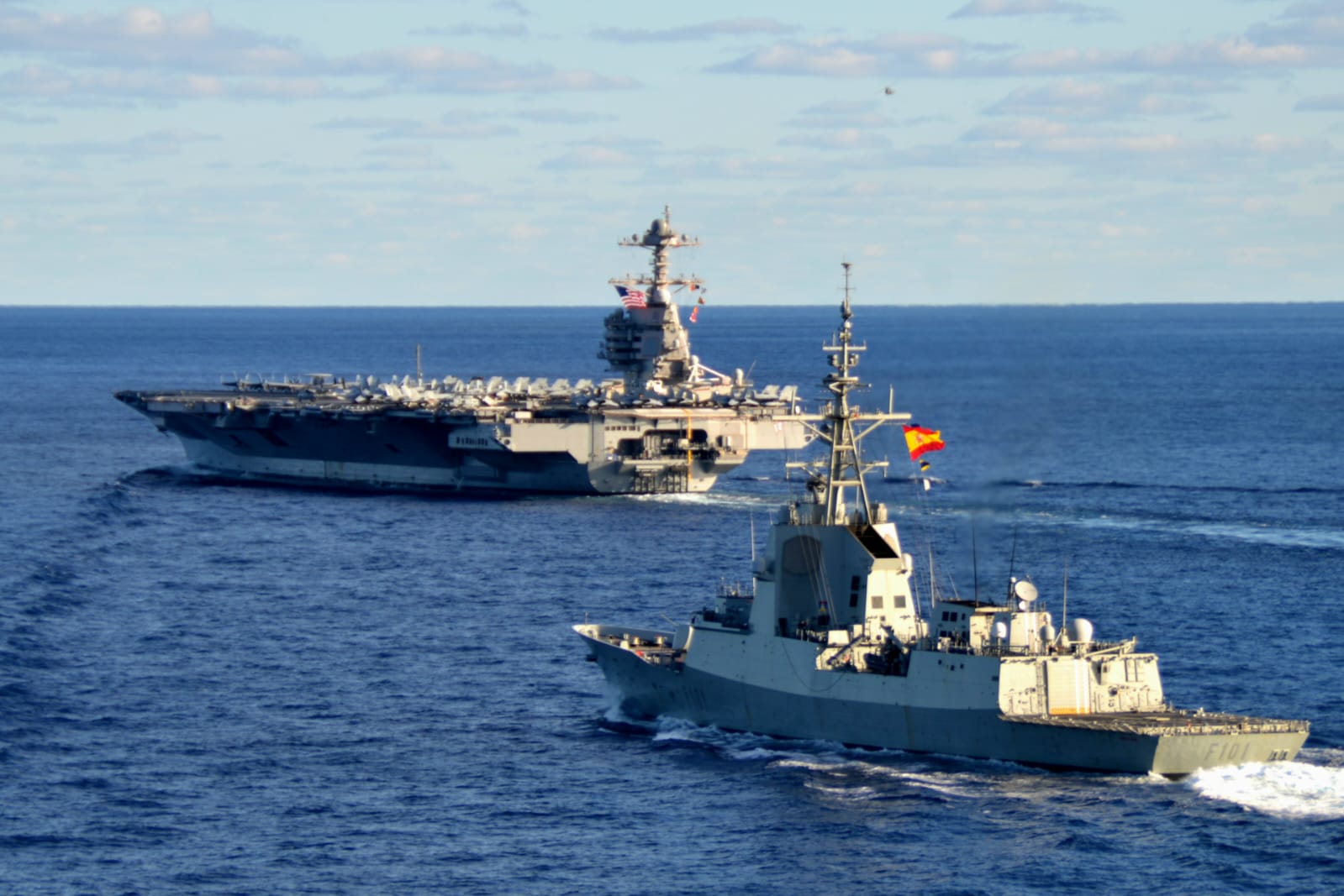 The Spanish frigate next to the aircraft carrier