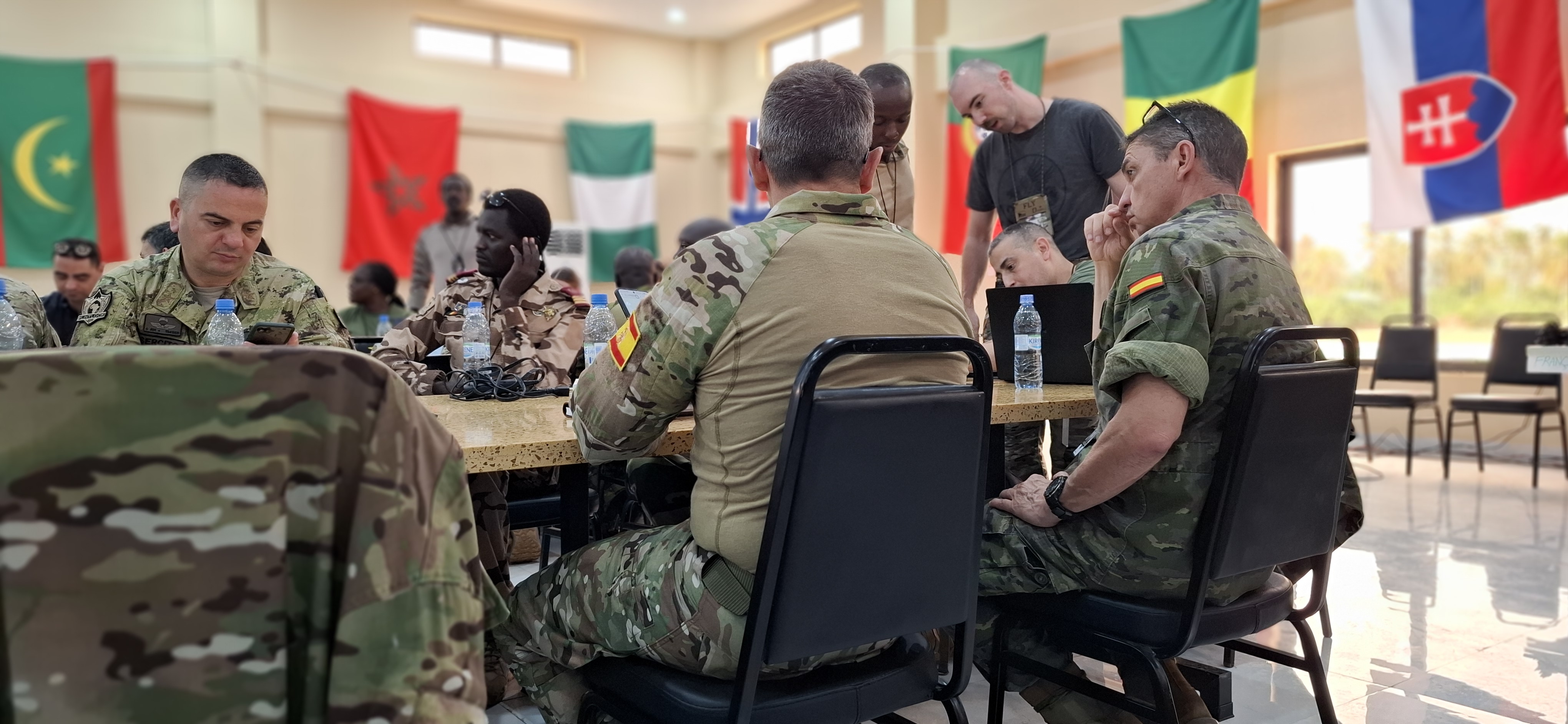 Spanish special operations personnel collaborating with African counterparts during an academic session