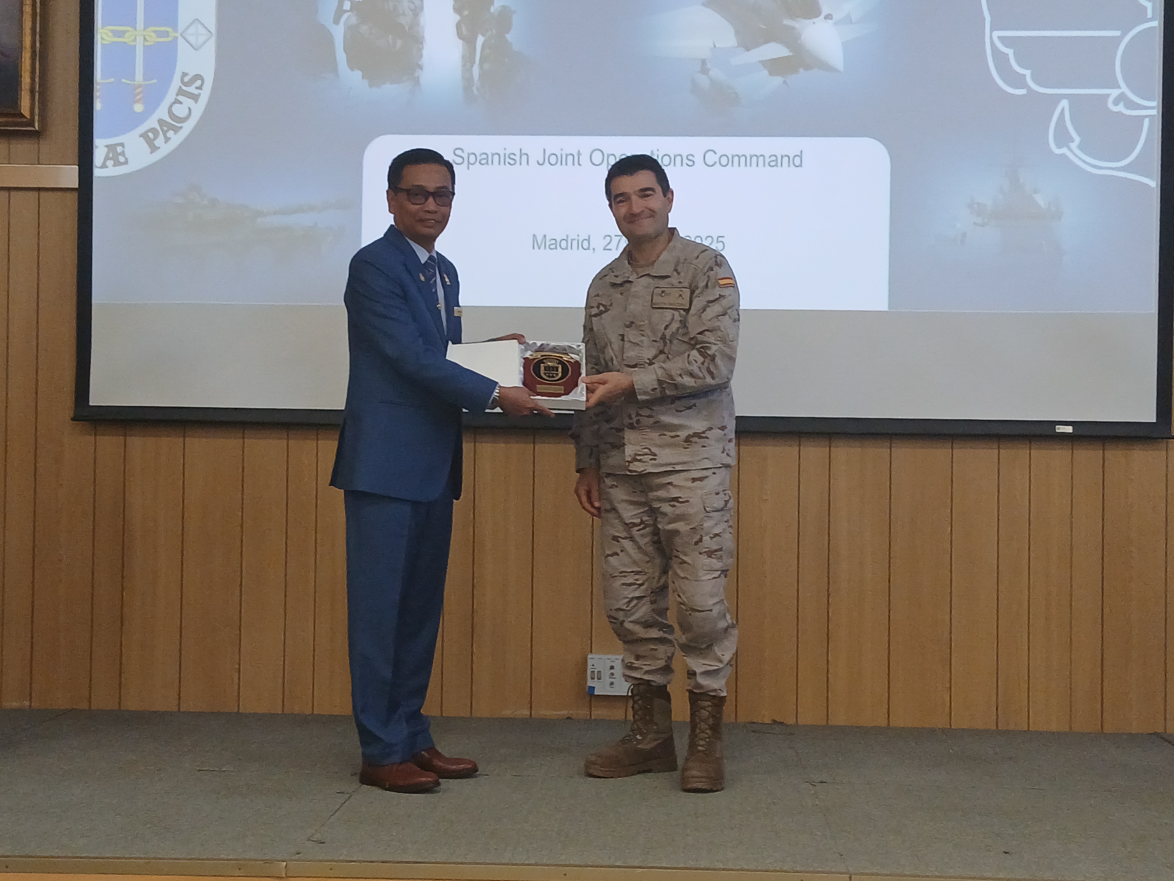 Formal presentation of a token of institutional appreciation