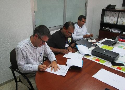 Signing the inspection report