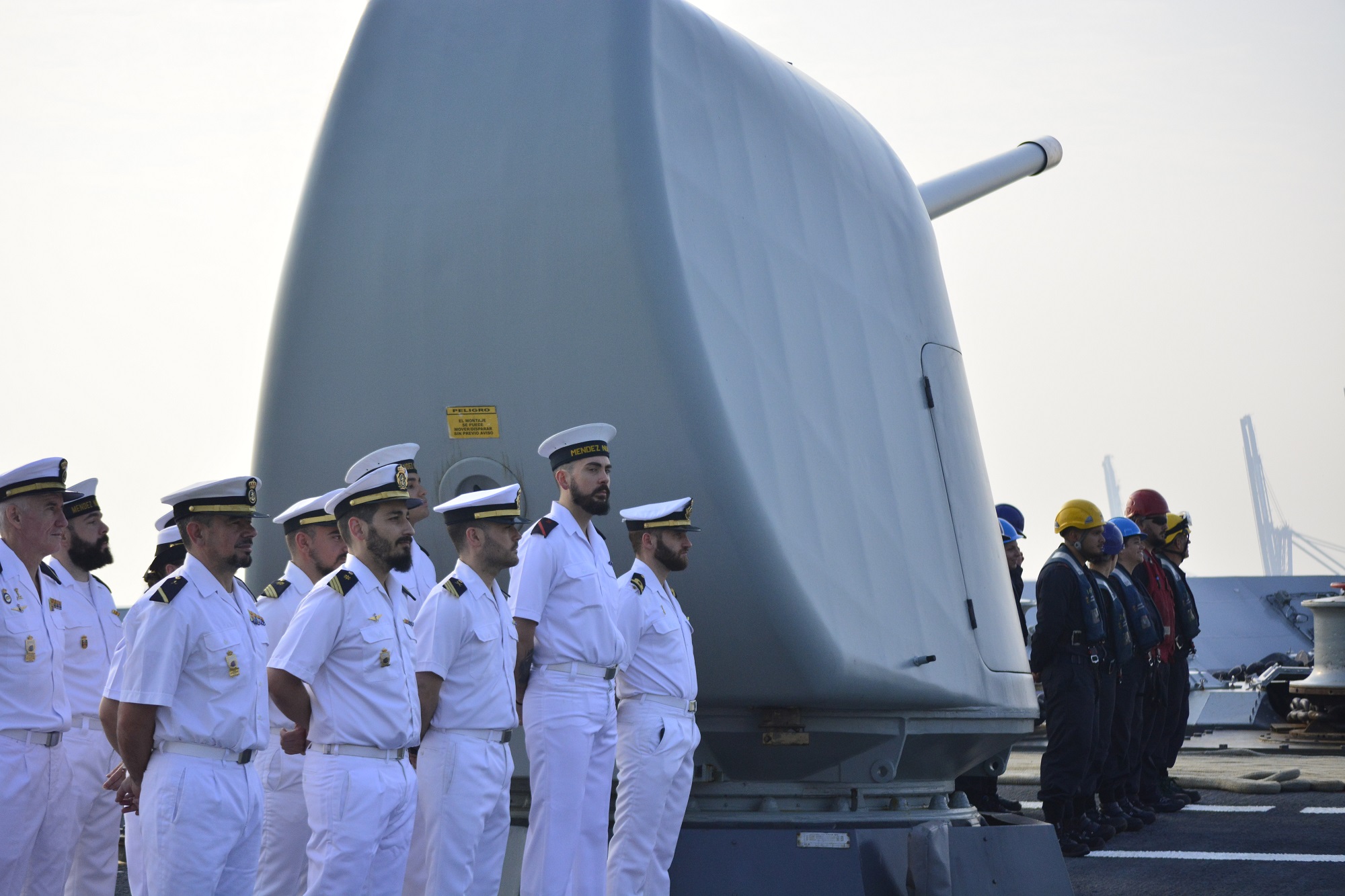 The ship’s crew formed up to welcome the visiting authorities.