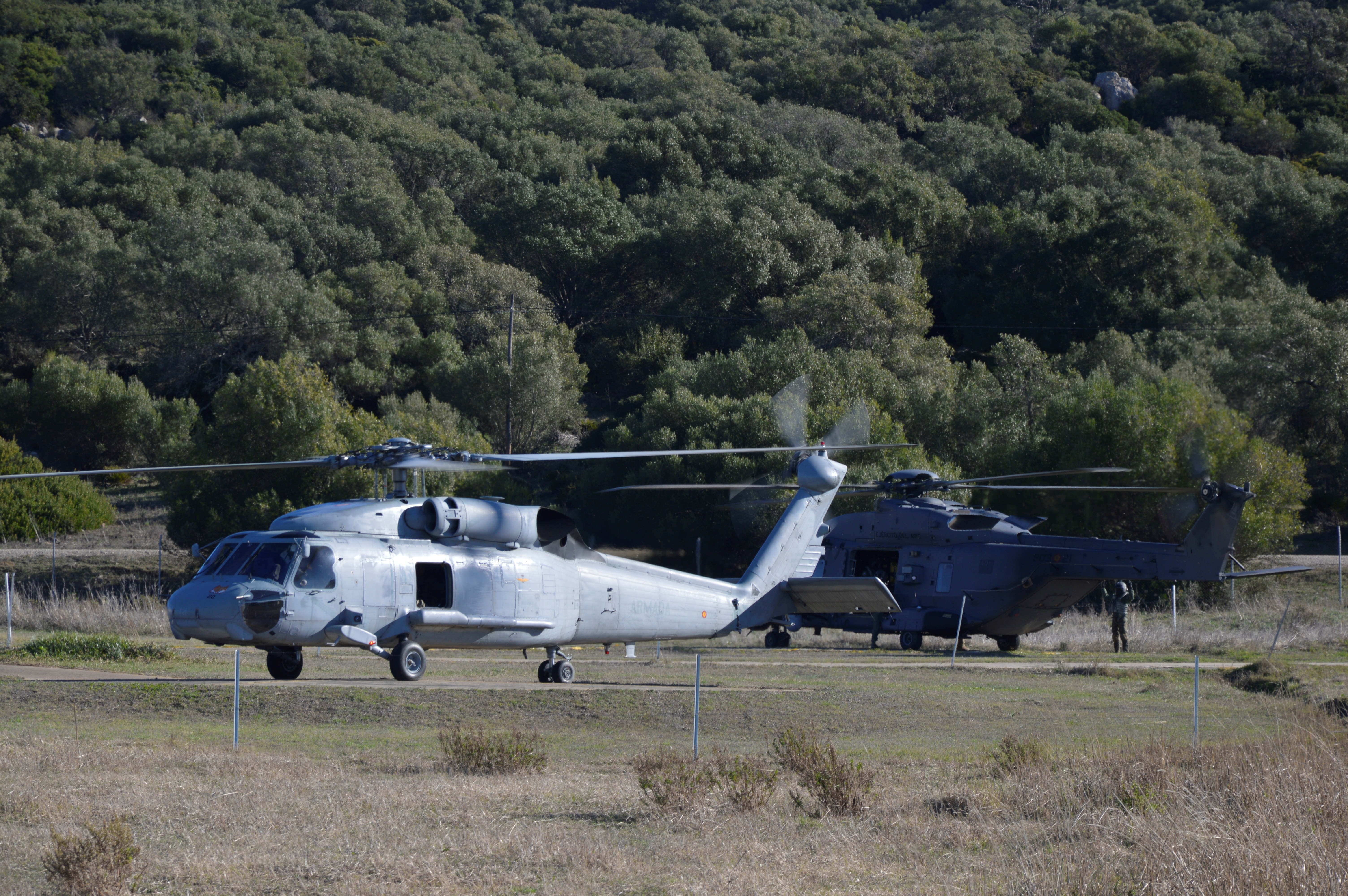 A Navy helicopter and another from the Air and Space Force during SOFEX-25 operations